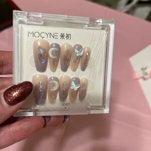 Press On Nails in Nude and Purple 7 sets.